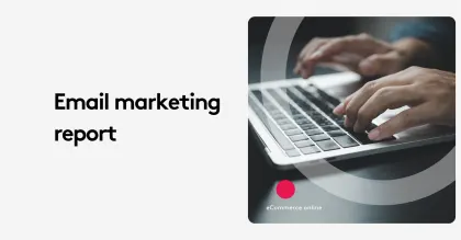 Hands typing on a laptop keyboard with email marketing report text.