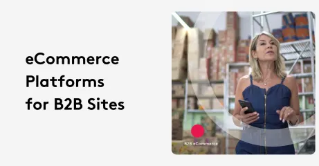 Businesswoman in warehouse using smartphone for B2B ecommerce platform.