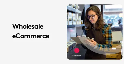 Woman in apron using tablet in wholesale store eCommerce setup