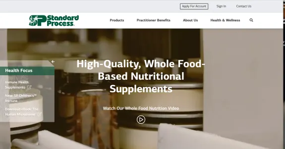 Standard Process homepage featuring nutritional supplements and health focus menu.