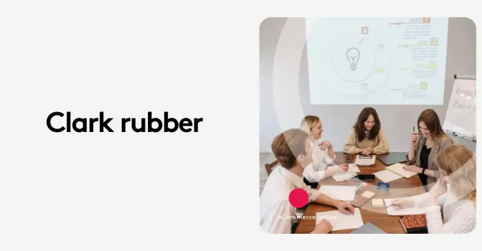 Team in a meeting room discussing ideas with presentation on screen