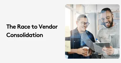 Two businessmen discussing vendor consolidation in an office setting.