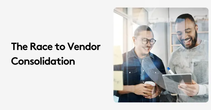 Two businessmen discussing vendor consolidation in an office setting.