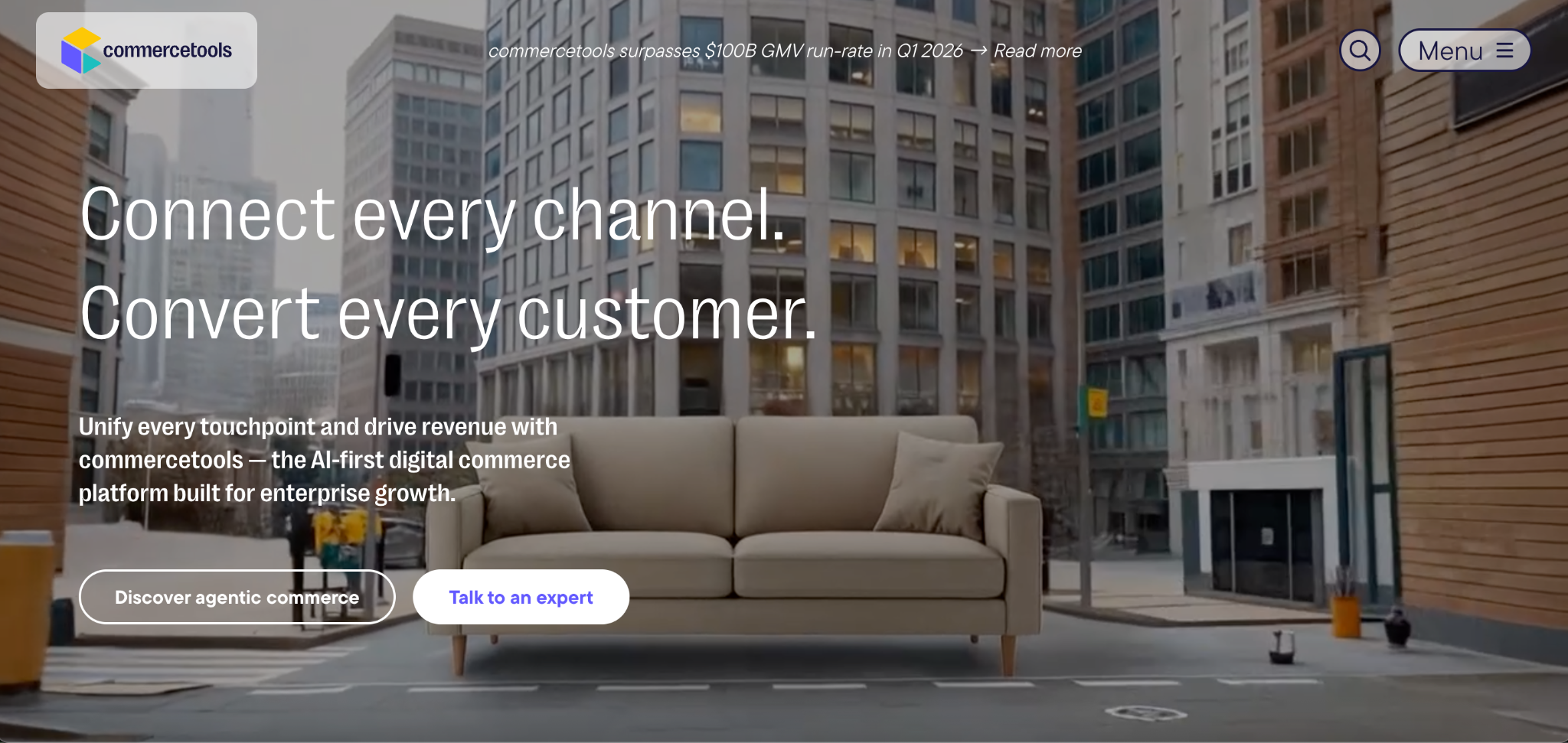 Commercetools digital commerce platform ad with urban background and sofa.