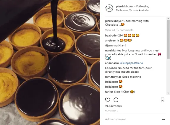 Chocolate being poured into tart shells for dessert preparation.