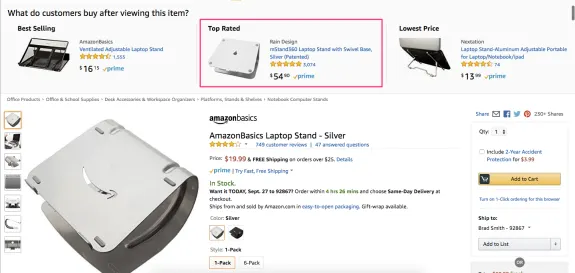 Amazon product page featuring various laptop stands with prices and ratings.