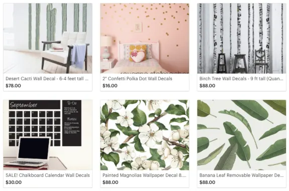 Collection of wall decals including cactus, polka dots, birch trees, chalkboard, magnolias, and banana leaf designs.