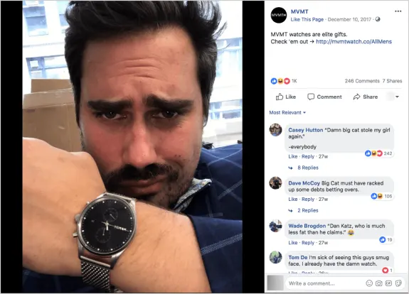 Person showing MVMT watch in a close-up selfie with a serious expression.