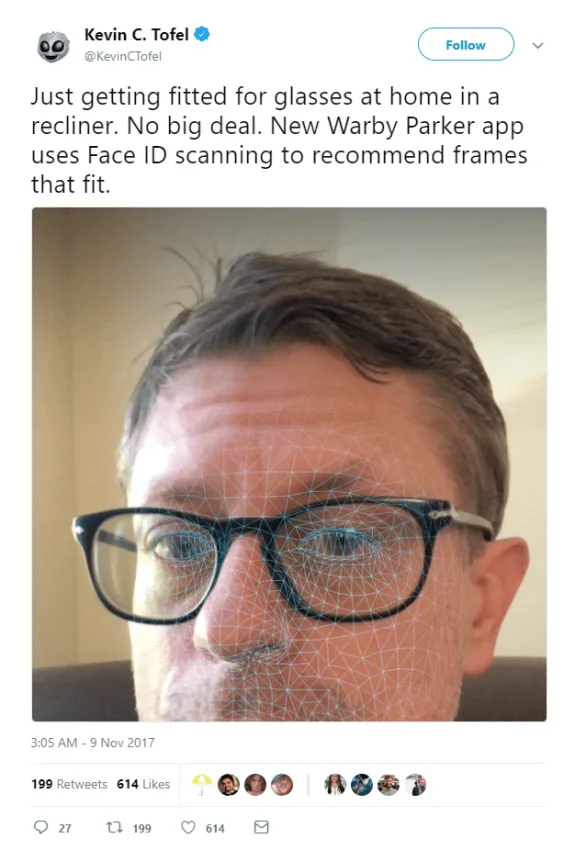 Person using Face ID scanning for glasses fitting with app