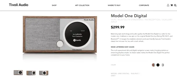 Tivoli Audio Model One Digital radio with walnut and grey design, featuring FM and Bluetooth connectivity.