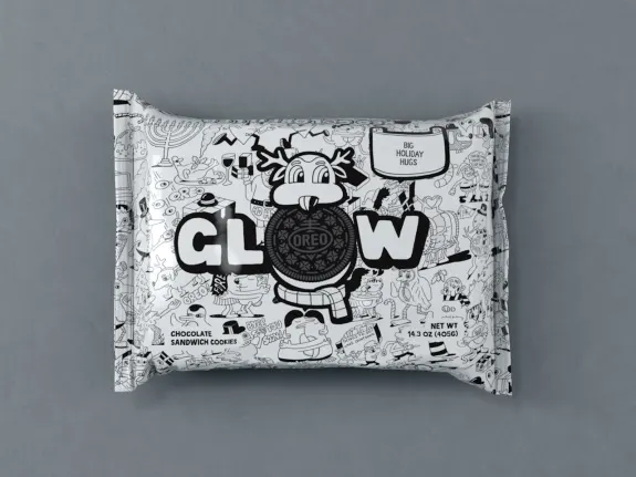 Oreo holiday edition cookie packaging featuring festive designs and the word GLOW.