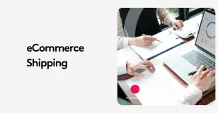 People in a meeting discussing eCommerce shipping with laptop and charts.