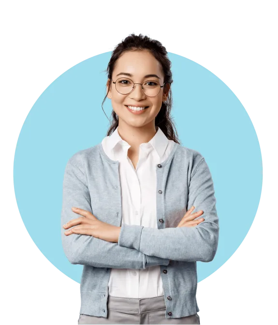 Woman in glasses smiling with arms crossed on blue background.