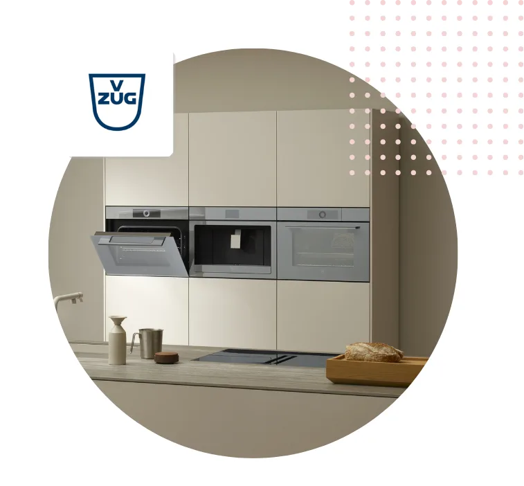 Modern kitchen setup featuring V-Zug appliances with sleek design.