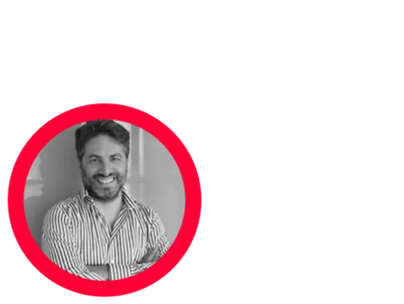 Smiling man in a striped shirt with a red circle border.